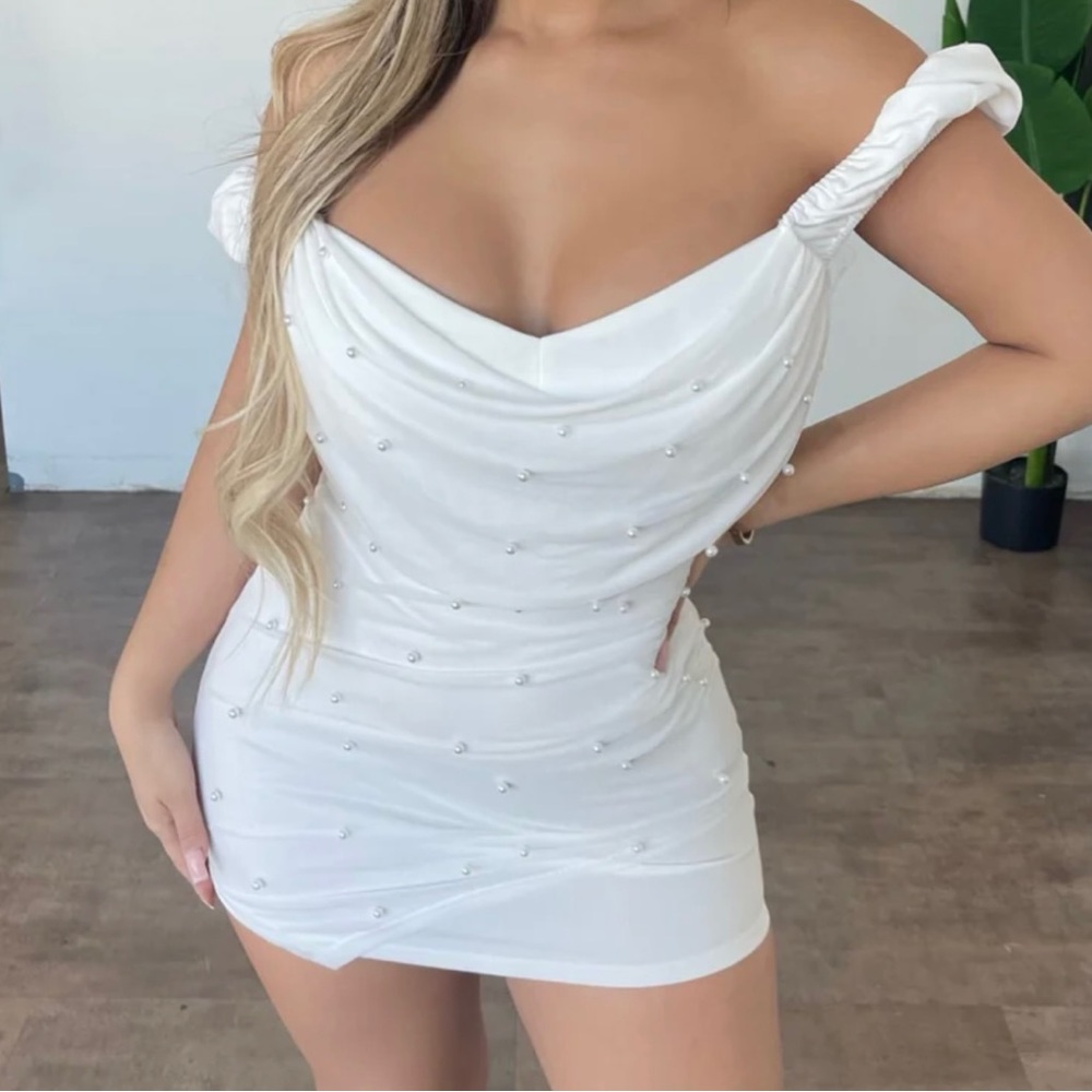 white mini dress with pearls all around 🤍